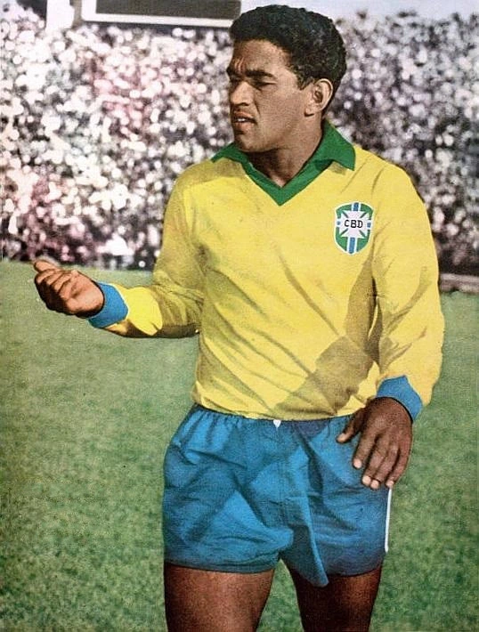 Garrincha in a Brazil national team kit on the pitch