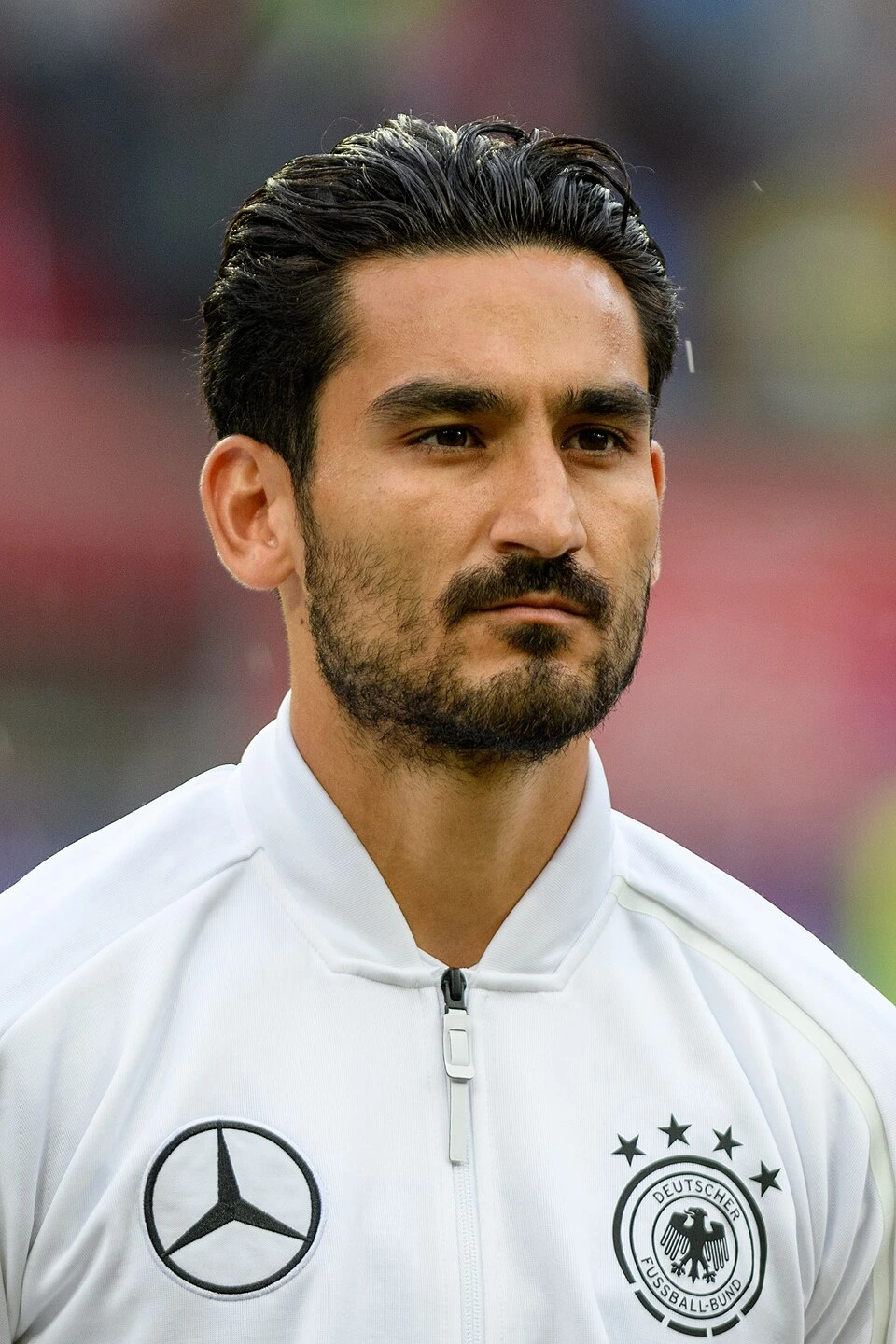İlkay Gündoğan in a German national team jacket during a football match warm-up portrait